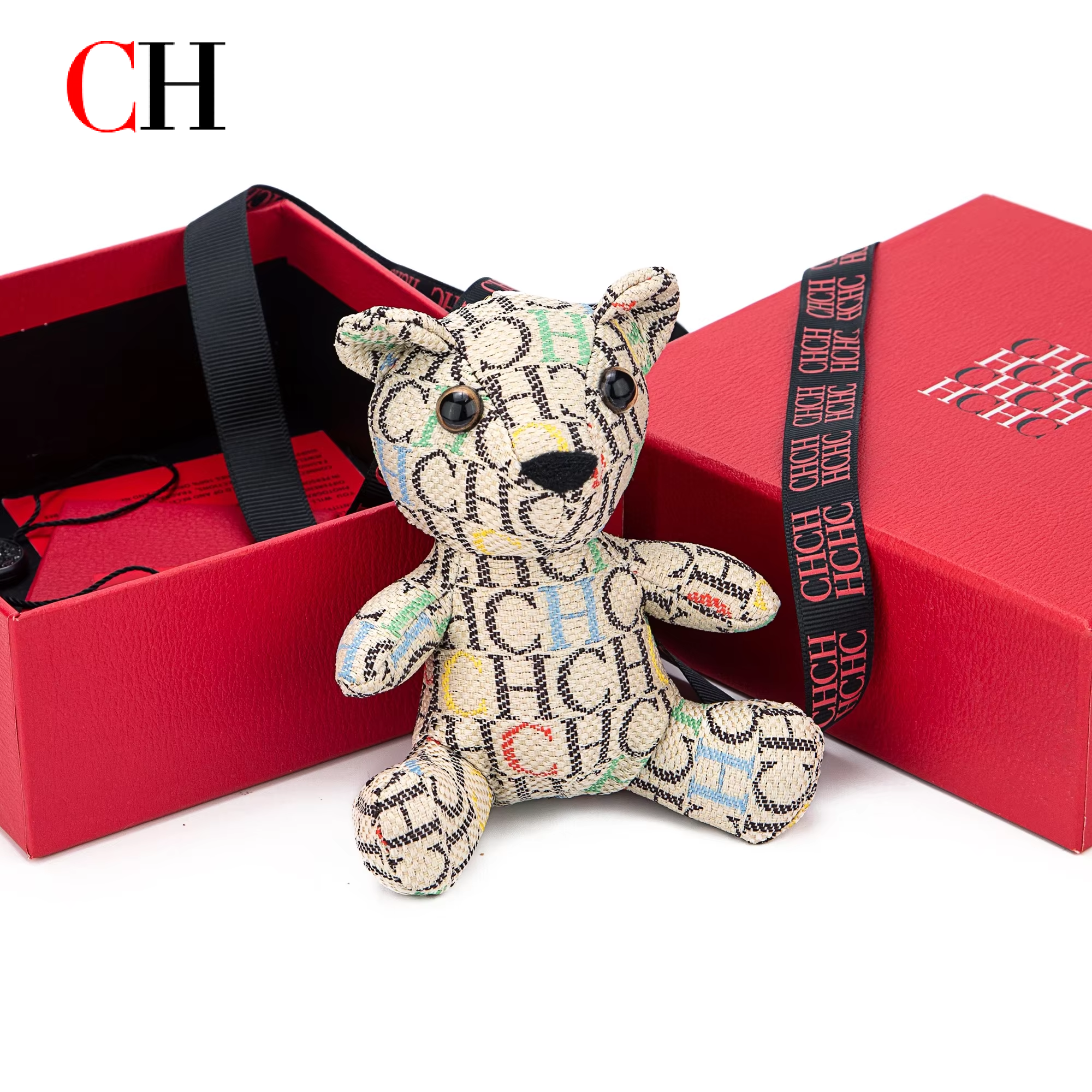 سلسلة مفاتيح على شكل دب من CH  - مراجعة Monogram Keychain Leather وسعره